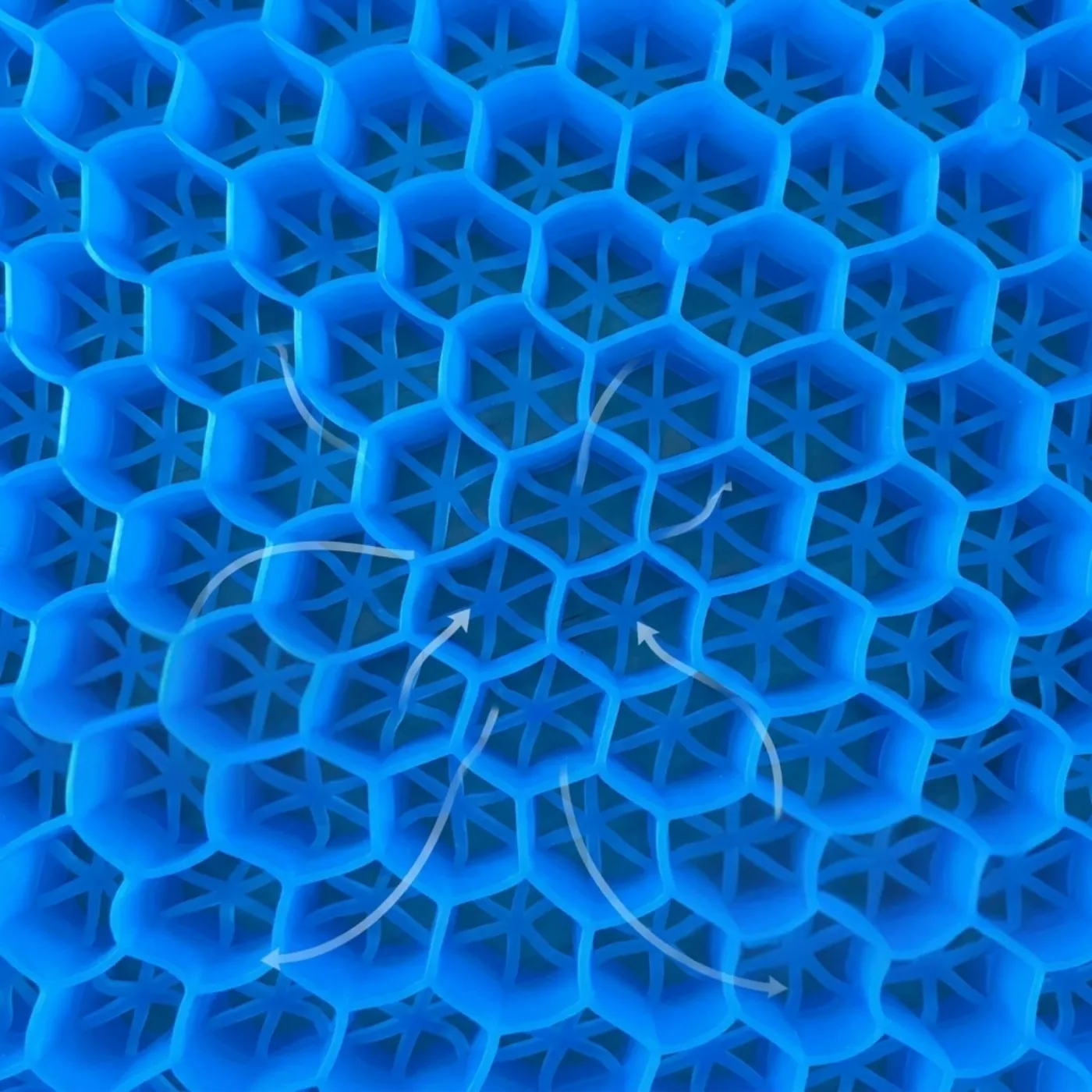 Gros plan macro sur la structure en gel alvéolé du coussin SIVEA